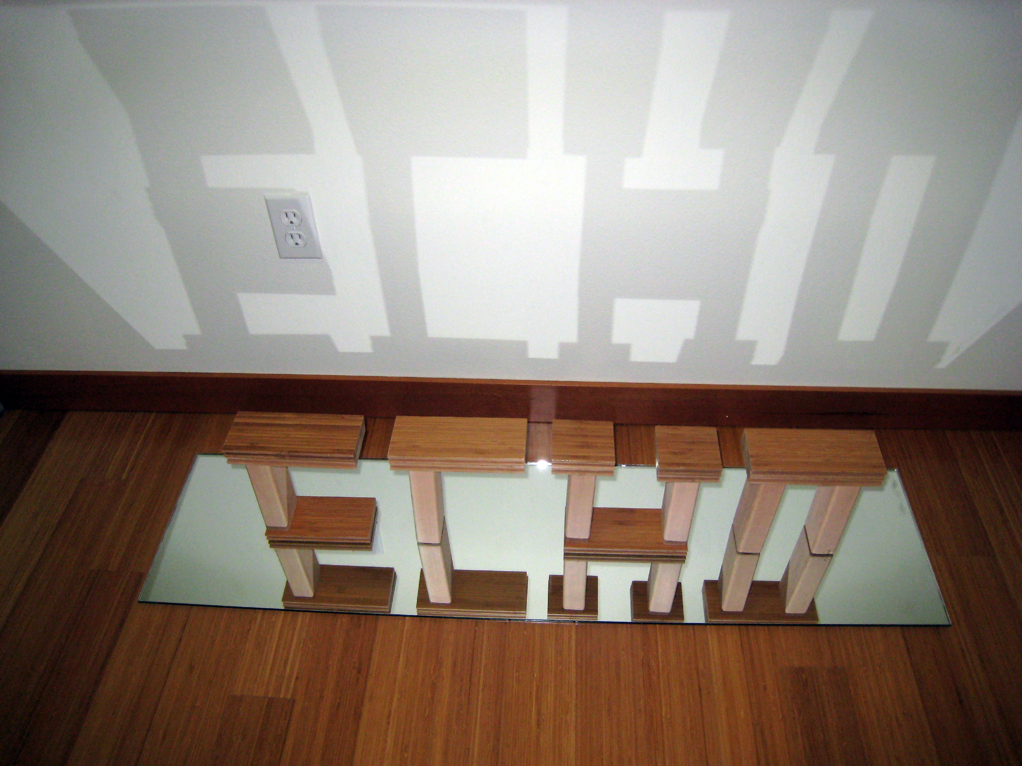 3D typography: 'ECHO' (bamboo, cedar, mirrored glass)